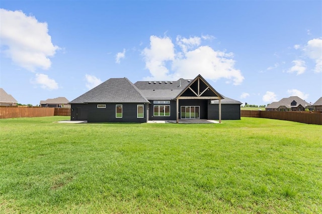 1233 Collis Ct, Newcastle, OK 73065 - back of property featuring a patio area, a fenced backyard, and a shingled roof