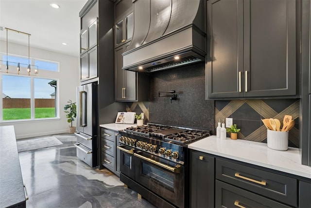 1233 Collis Ct, Newcastle, OK 73065 - kitchen with high end appliances, custom range hood, decorative backsplash, light stone counters, and recessed lighting