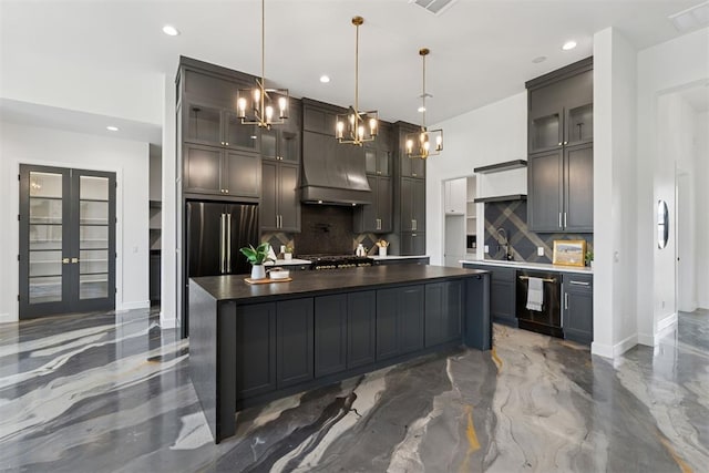 1233 Collis Ct, Newcastle, OK 73065 - kitchen with tasteful backsplash, black dishwasher, a chandelier, dark countertops, and a spacious island