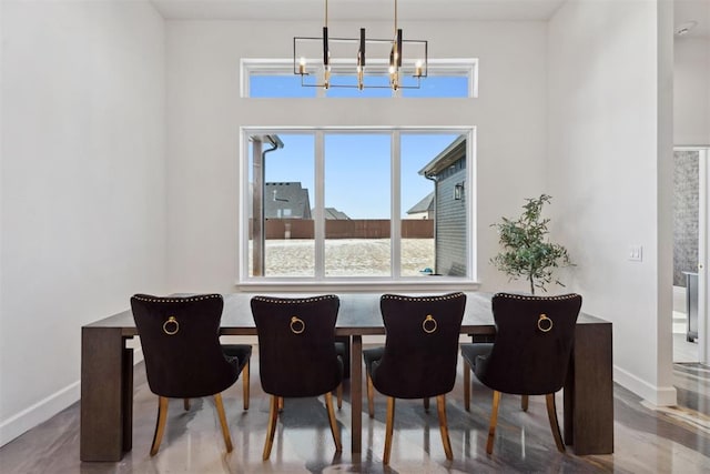 1233 Collis Ct, Newcastle, OK 73065 - dining room featuring a chandelier and a high ceiling