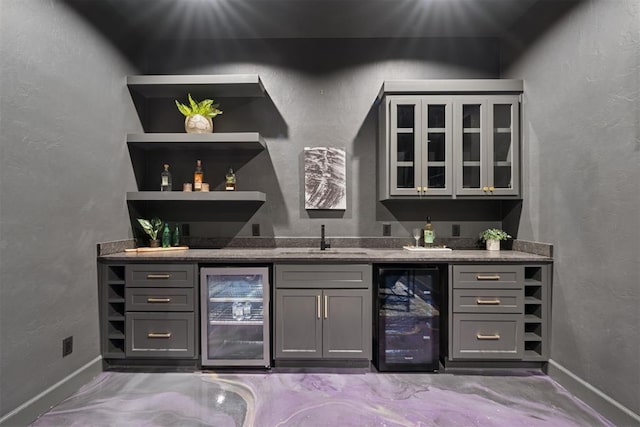 1233 Collis Ct, Newcastle, OK 73065 - indoor wet bar with wine cooler and a textured wall