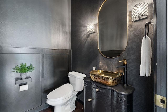 1233 Collis Ct, Newcastle, OK 73065 - half bath featuring wood finished floors and vanity