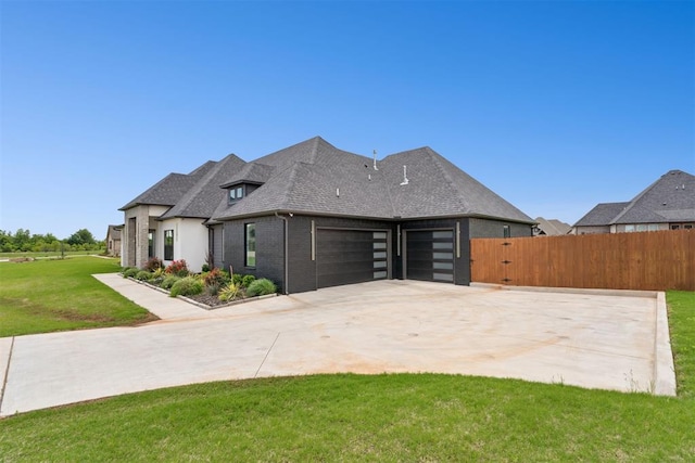 1233 Collis Ct, Newcastle, OK 73065 - view of property exterior featuring an attached garage, brick siding, driveway, and roof with shingles
