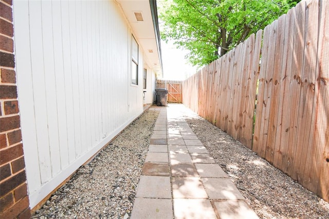 view of property exterior featuring a fenced backyard