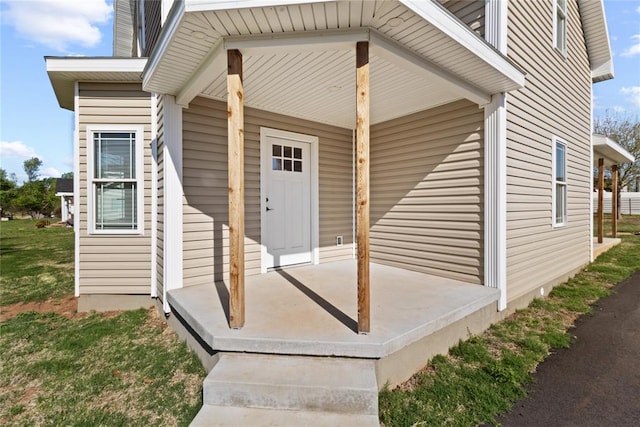 doorway to property with a porch