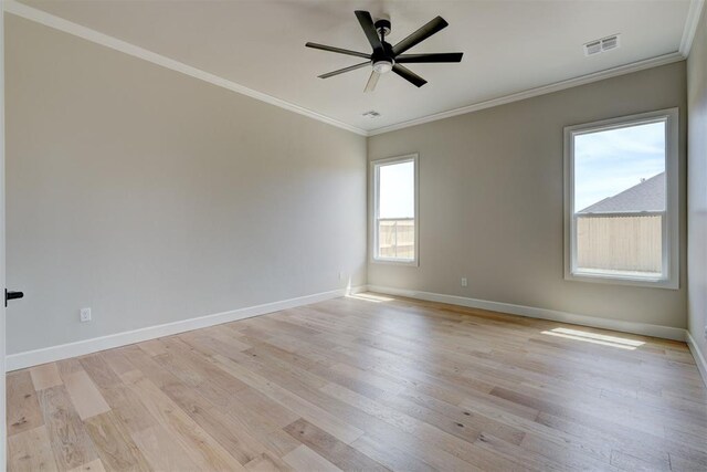 6508 NW 146th St, Oklahoma City, OK 73142 - spare room featuring light wood-type flooring, baseboards, visible vents, a ceiling fan, and ornamental molding