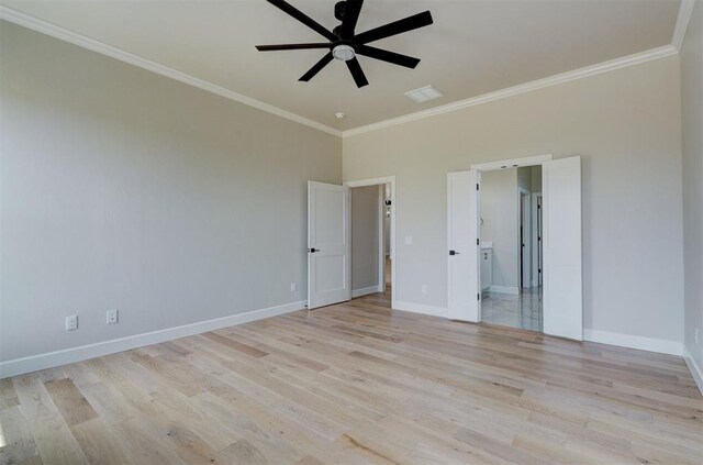 6508 NW 146th St, Oklahoma City, OK 73142 - unfurnished bedroom with baseboards, crown molding, and light wood finished floors