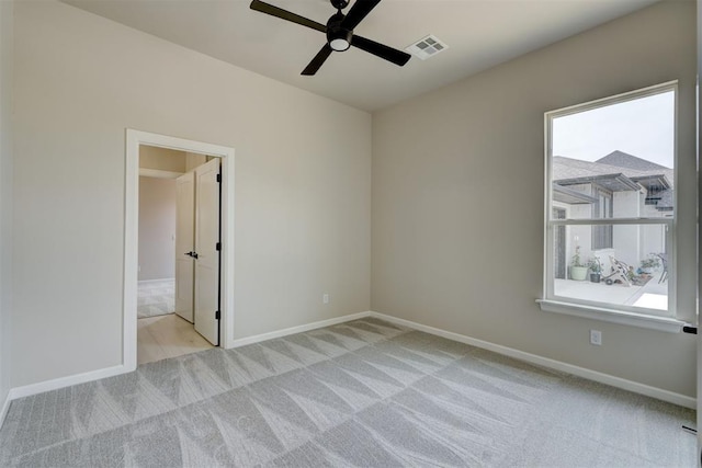 6508 NW 146th St, Oklahoma City, OK 73142 - unfurnished room with carpet, visible vents, a ceiling fan, and plenty of natural light