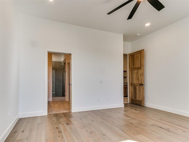 unfurnished room featuring baseboards, light wood-type flooring, ceiling fan, and recessed lighting
