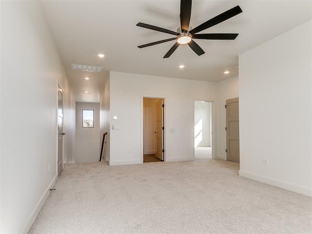 spare room featuring visible vents, a ceiling fan, light colored carpet, and recessed lighting