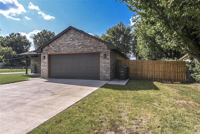 1717 Breckenridge Dr, Oklahoma City, OK 73115 - view of side of property featuring fence, driveway, brick siding, and a yard