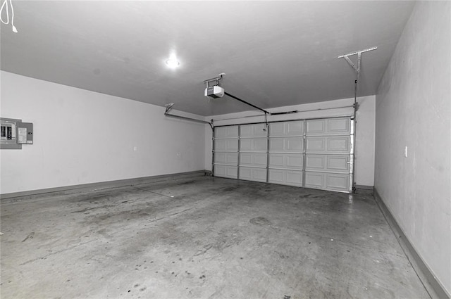 1717 Breckenridge Dr, Oklahoma City, OK 73115 - garage featuring electric panel and a garage door opener