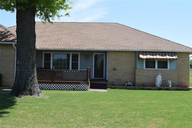 1400 S Indian Meridian Rd, Choctaw, OK 73020 - rear view of property with a lawn, brick siding, and roof with shingles