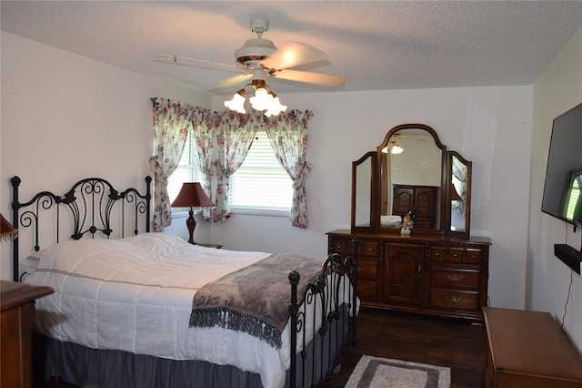 1400 S Indian Meridian Rd, Choctaw, OK 73020 - bedroom featuring a ceiling fan and dark wood-style floors