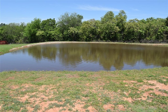 1400 S Indian Meridian Rd, Choctaw, OK 73020 - property view of water with a wooded view