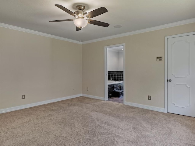 3025 Pine Ridge Rd, Oklahoma City, OK 73120 - spare room featuring a ceiling fan, baseboards, light colored carpet, and crown molding