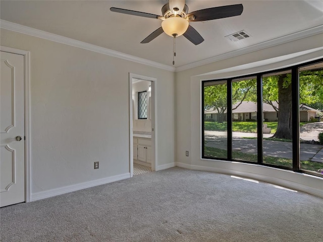 3025 Pine Ridge Rd, Oklahoma City, OK 73120 - carpeted spare room with baseboards, visible vents, ornamental molding, and ceiling fan