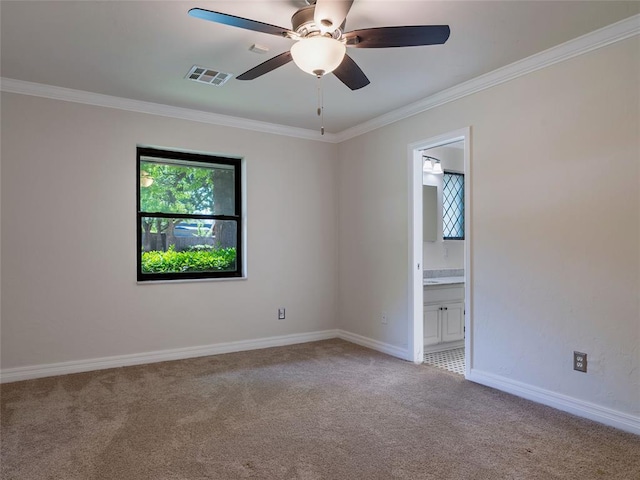 3025 Pine Ridge Rd, Oklahoma City, OK 73120 - carpeted spare room with visible vents, ornamental molding, baseboards, and ceiling fan