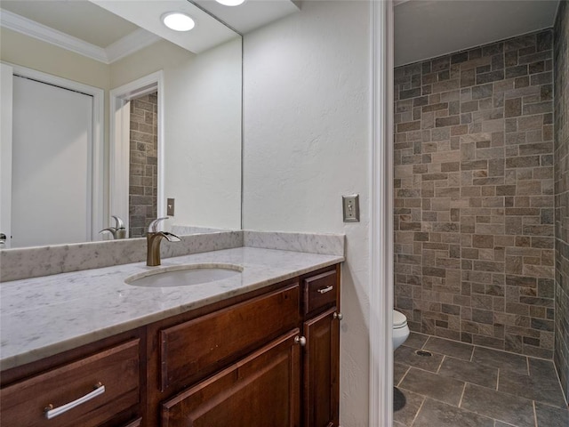 3025 Pine Ridge Rd, Oklahoma City, OK 73120 - bathroom with crown molding, vanity, and toilet