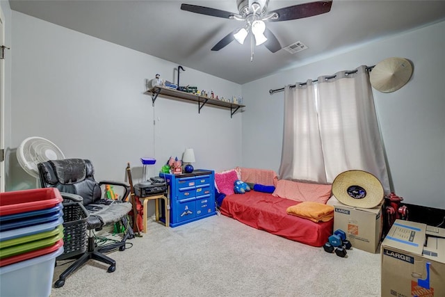 bedroom with carpet floors, visible vents, and ceiling fan