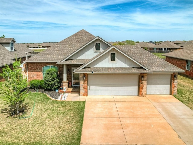 view of front facade featuring concrete driveway, a front lawn, and roof with shingles