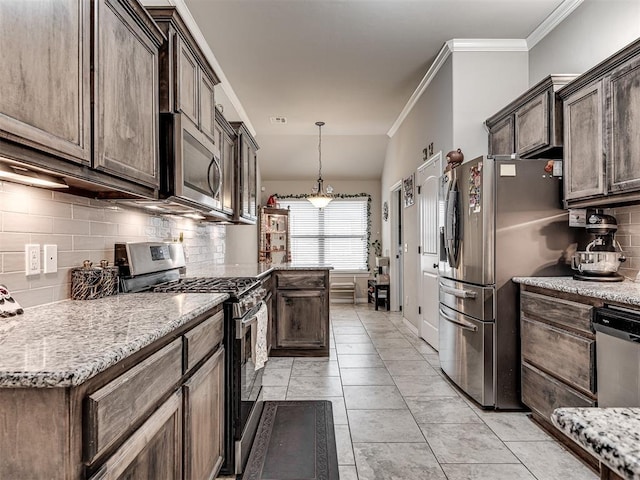kitchen with light stone counters, backsplash, dark brown cabinets, ornamental molding, and appliances with stainless steel finishes