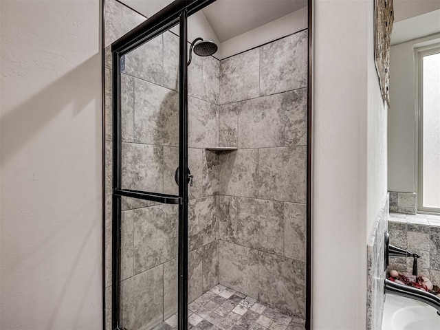 bathroom with a shower stall