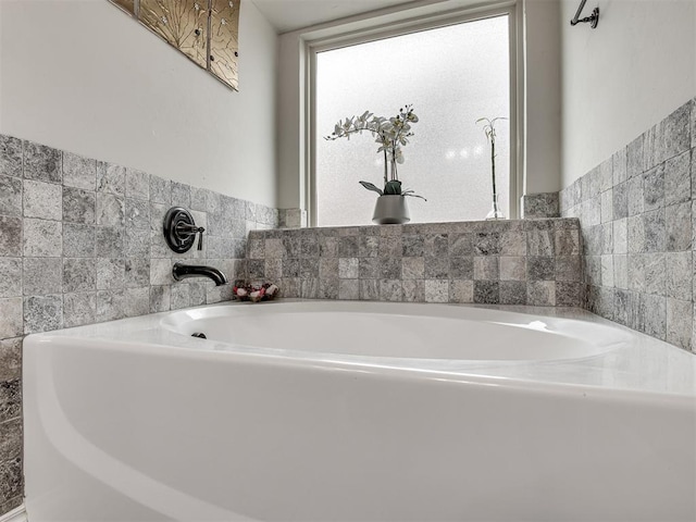 full bathroom with a garden tub