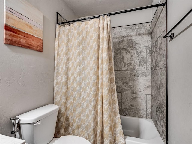 full bathroom featuring toilet and shower / bathtub combination with curtain