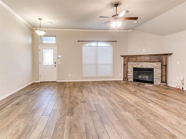 18232 Scarborough Dr, Edmond, OK 73012 - unfurnished living room featuring light wood finished floors, ceiling fan, a fireplace, and crown molding