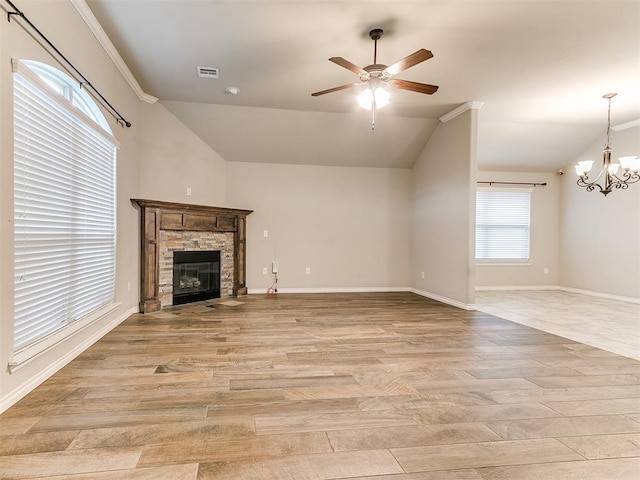 18232 Scarborough Dr, Edmond, OK 73012 - unfurnished living room featuring lofted ceiling, light wood-type flooring, a ceiling fan, a chandelier, and a fireplace