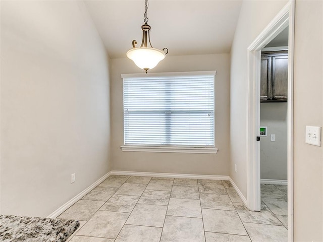 18232 Scarborough Dr, Edmond, OK 73012 - unfurnished dining area with baseboards