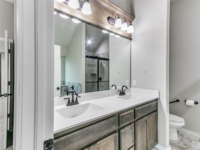 18232 Scarborough Dr, Edmond, OK 73012 - full bath featuring marble look tiles, double vanity, and a stall shower