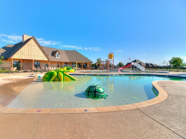 18232 Scarborough Dr, Edmond, OK 73012 - community pool featuring a water play area and a patio area