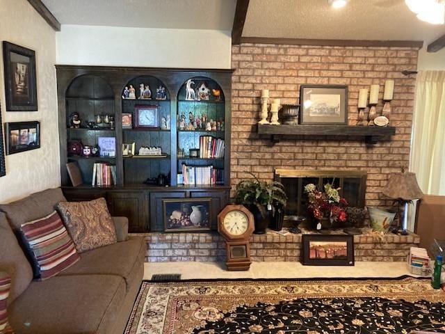 living room featuring a brick fireplace