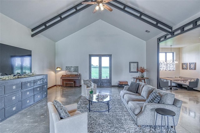25478 Sooner Ave, Purcell, OK 73080 - living area with concrete floors, plenty of natural light, high vaulted ceiling, and a ceiling fan