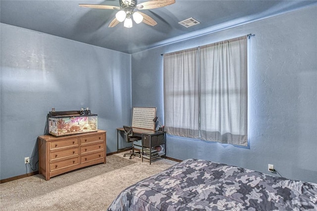 25478 Sooner Ave, Purcell, OK 73080 - bedroom with carpet, ceiling fan, and a textured wall
