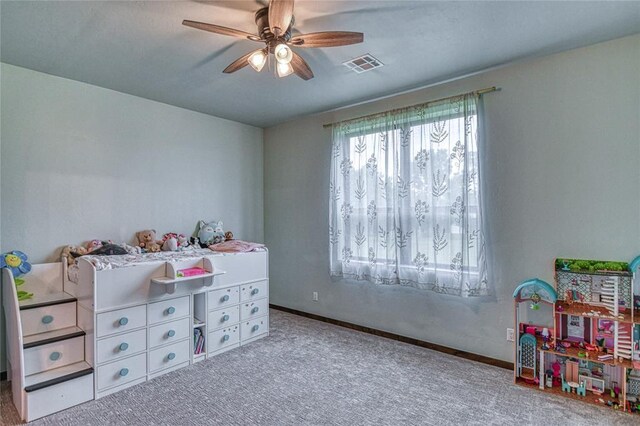 25478 Sooner Ave, Purcell, OK 73080 - playroom with ceiling fan and carpet floors