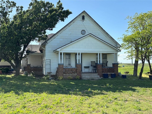 27582 N 2840th Rd, Okarche, OK 73762 - view of front of property featuring covered porch and a front yard