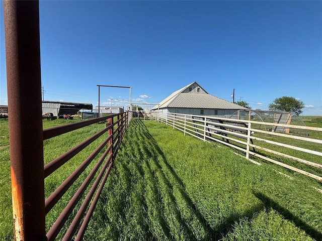 27582 N 2840th Rd, Okarche, OK 73762 - view of yard featuring an outdoor structure, an exterior structure, and a view of countryside