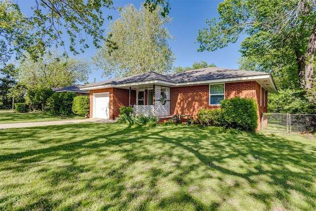 10 Burk Way, Del City, OK 73115 - single story home with an attached garage, fence, a front yard, and brick siding