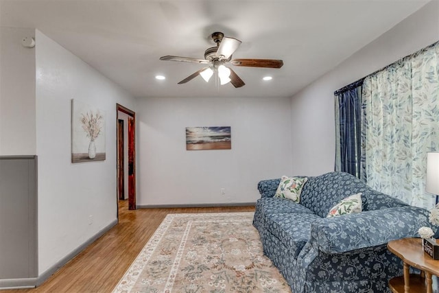 10 Burk Way, Del City, OK 73115 - living area featuring baseboards, wood finished floors, recessed lighting, and ceiling fan