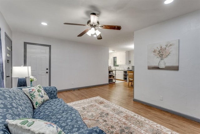 10 Burk Way, Del City, OK 73115 - living area featuring baseboards, a ceiling fan, wood finished floors, and recessed lighting