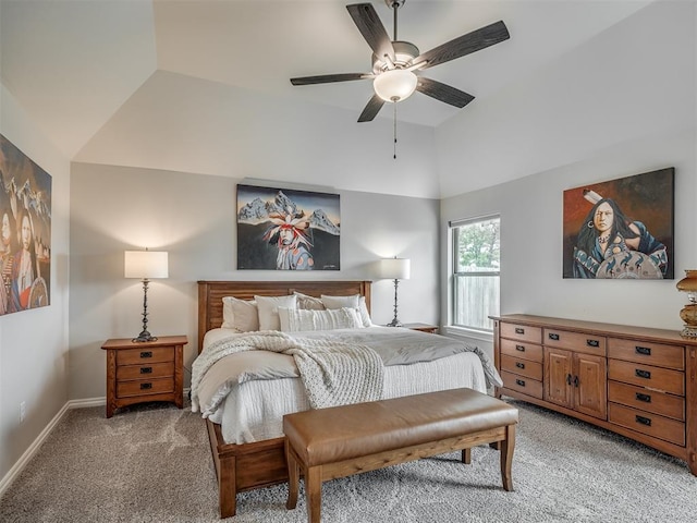 bedroom featuring light colored carpet, a ceiling fan, baseboards, and lofted ceiling