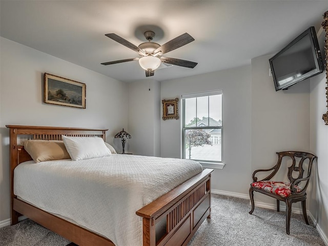 bedroom with baseboards, carpet floors, and ceiling fan