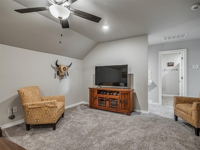 living area featuring visible vents, carpet flooring, and baseboards
