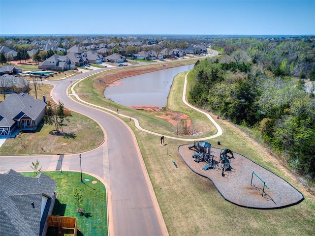 aerial view with a water view and a residential view