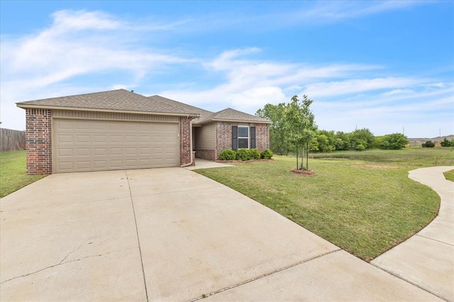 ranch-style home featuring a front lawn, driveway, an attached garage, and brick siding