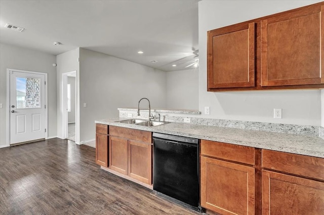 kitchen with a sink, visible vents, dark wood finished floors, black dishwasher, and a ceiling fan