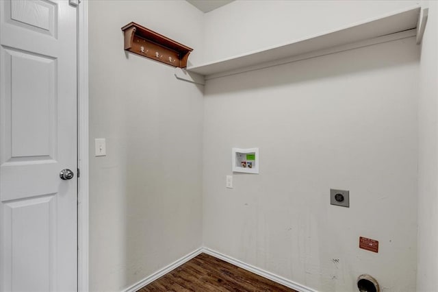 clothes washing area featuring laundry area, hookup for an electric dryer, washer hookup, dark wood-style flooring, and baseboards